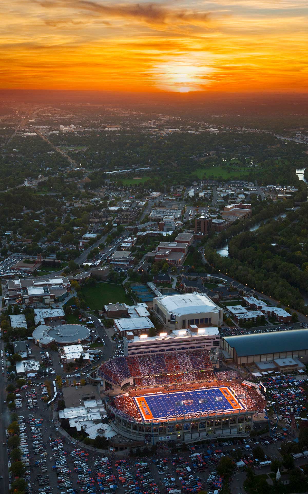 Aerial Photography-Boise State Football at Albertson Stadium, With Boise River and Boise State University Under Sunset.