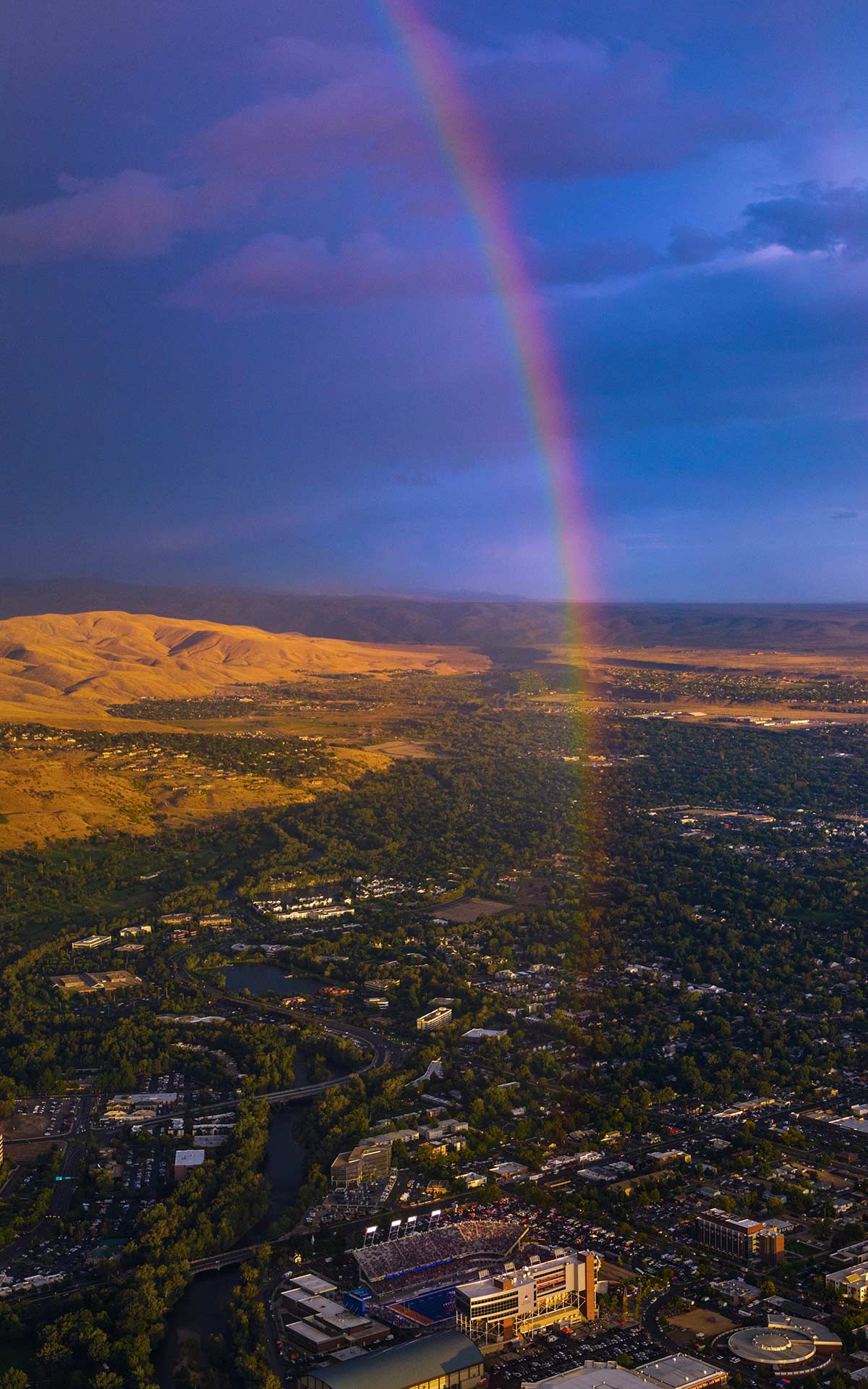 Aerial Photography-East Boise and Boise State Division 1 Football Game at Sunset with Natural Rainbow.