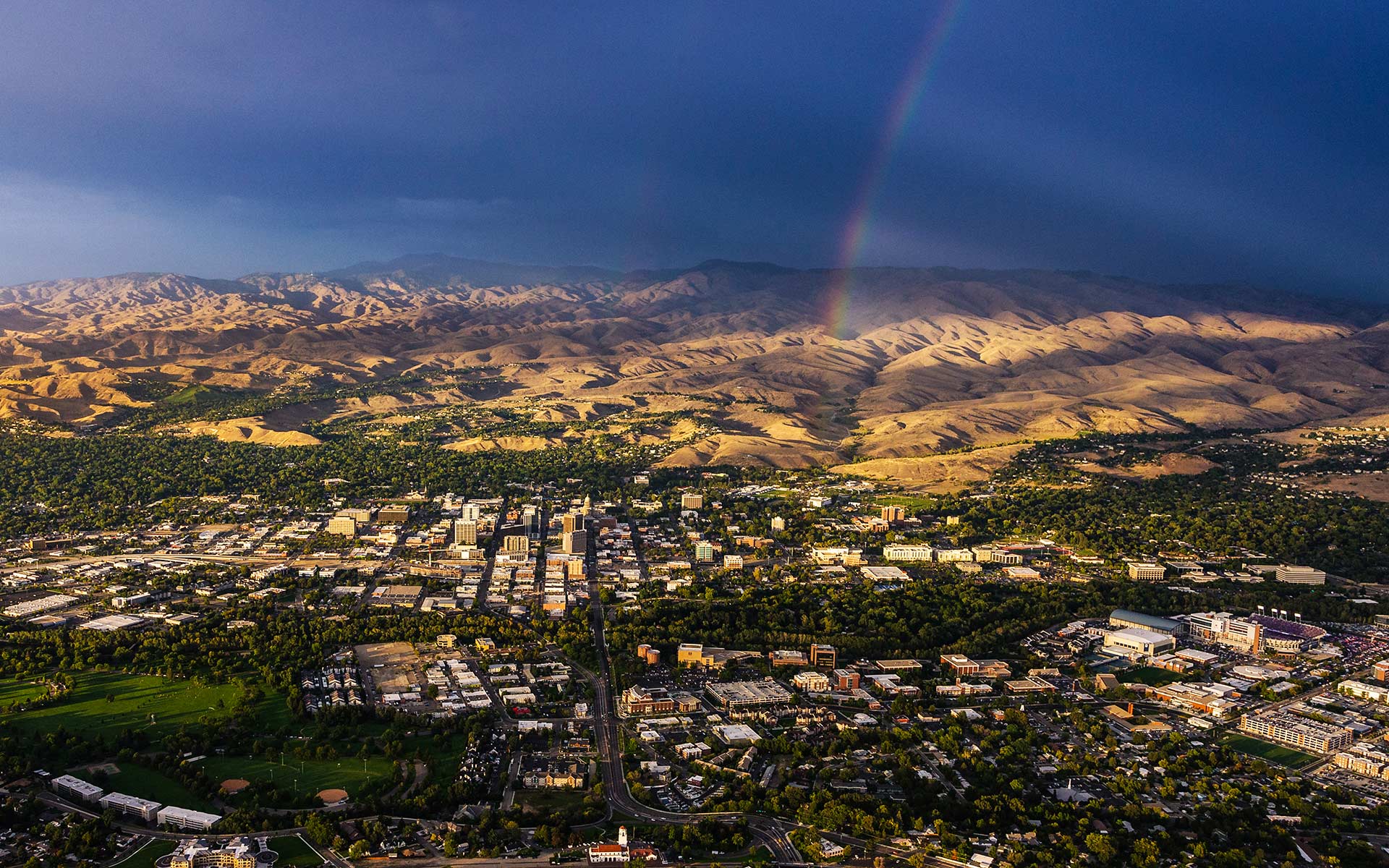 Aerial Photography-Downtown Boise, Idaho, BSU Division 1 Football, and Foothills, with Rainbow.