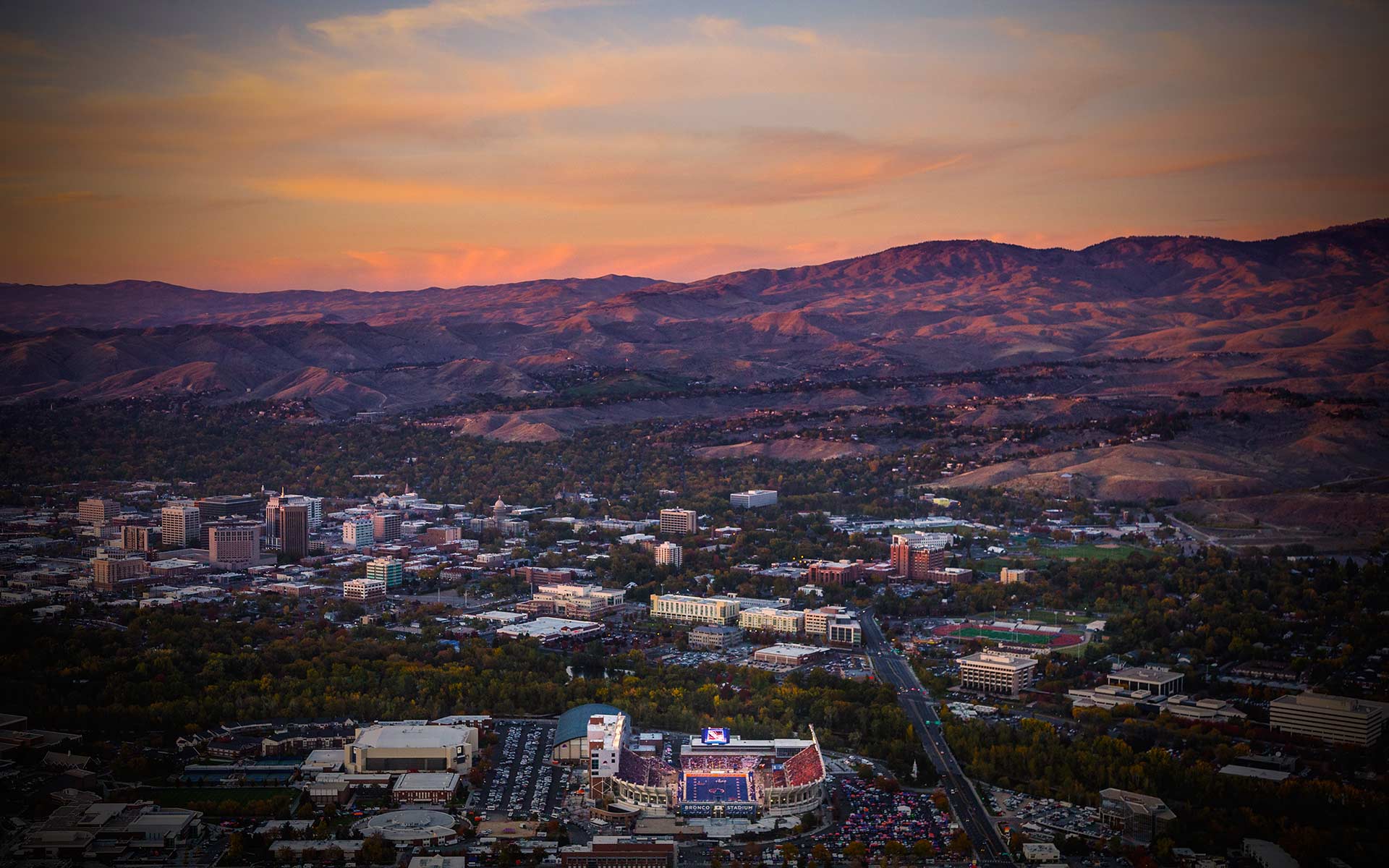 Aerial Photography-Boise State Football, Downtown Boise, and Foothills at Sunset.