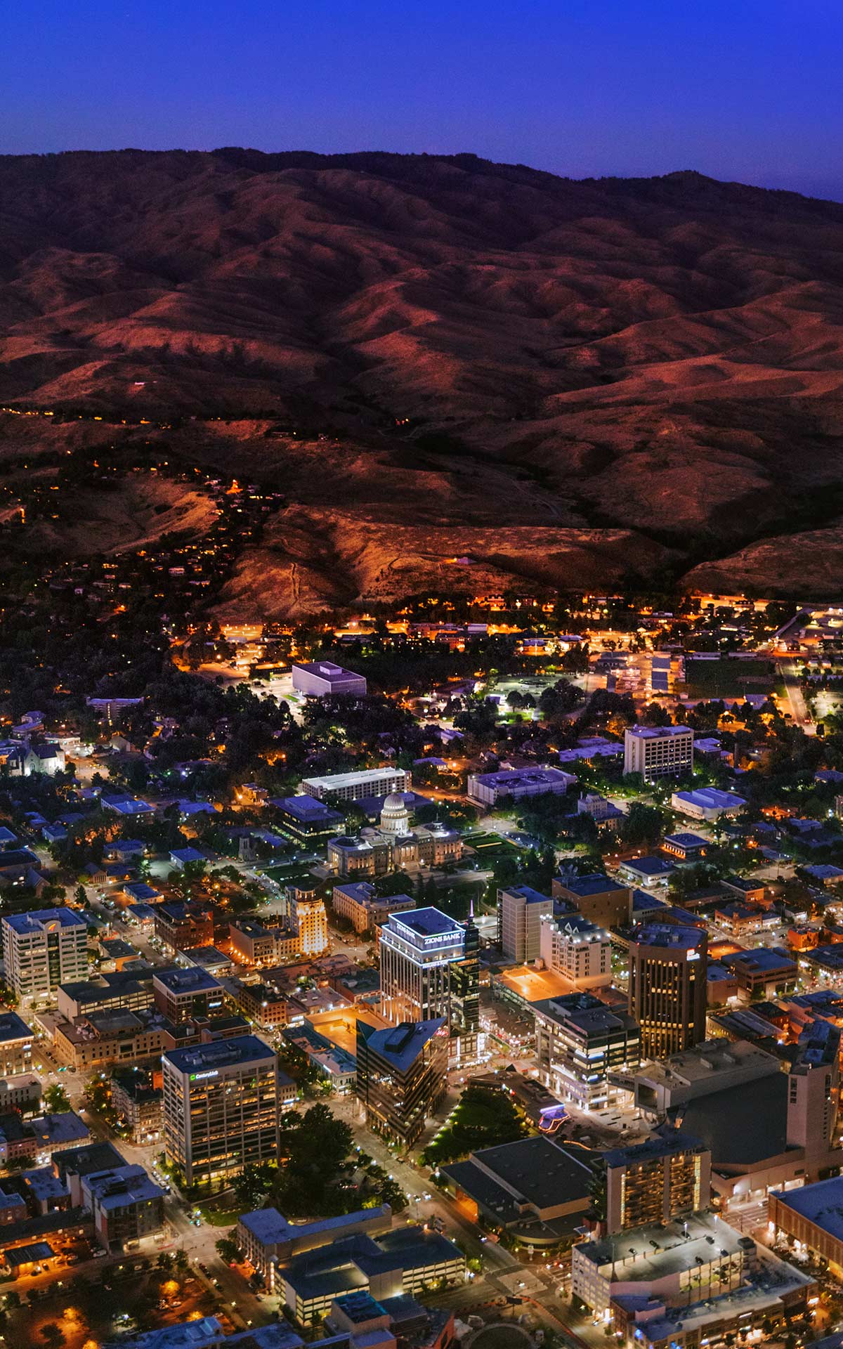 Aerial Photography-Downtown Boise, Idaho and Foothills, at Sunset.
