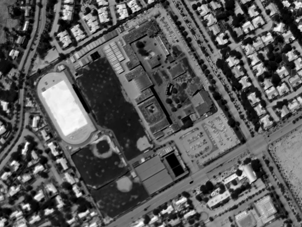 Daytime Aerial Thermograph of Riverside (California) Poly High. The Apparent Temperature of the Synthetic Turf Approximates 180°F.