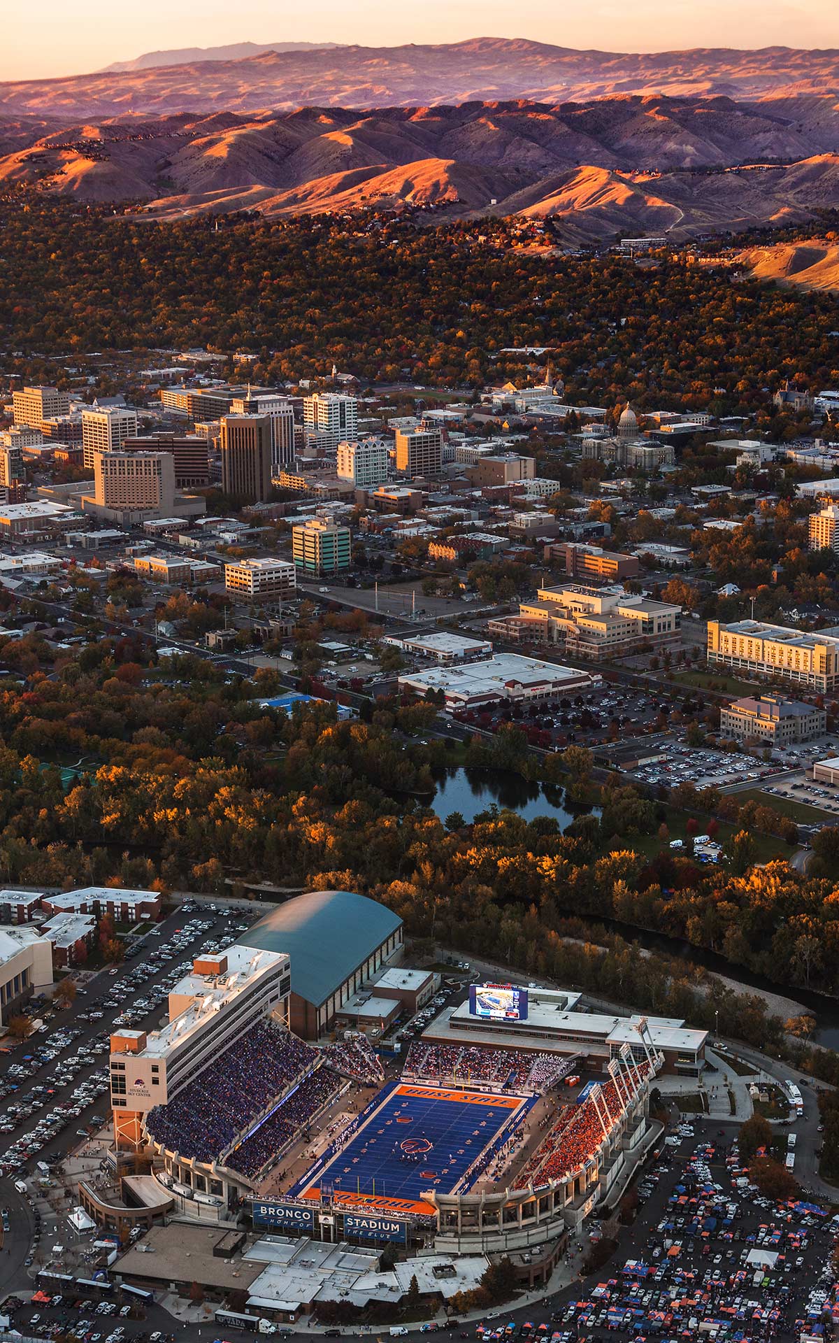 Aerial Photography-Boise State Football with Boise River, Downtown Boise, and Boise Foothills Near Sunset.