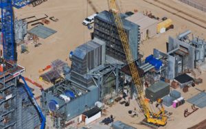 Aerial Photography, Turbine and Crane at Natural Gas Generation Plant During Construction.