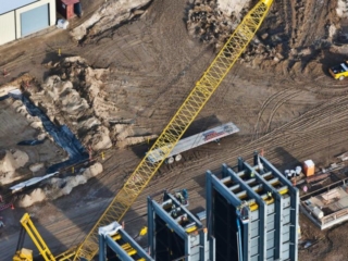 Aerial Photography-Crane Placing Heat Exchangers at Natural Gas Generation Plant During Construction.