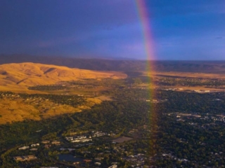Aerial Photography-East Boise and Boise State Division 1 Football Game at Sunset with Natural Rainbow.