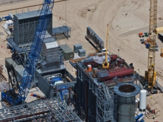 Aerial Photography-Construction of Natural Gas Power Generation Plant: Cranes, Heat Exchangers, Turbine Engine.