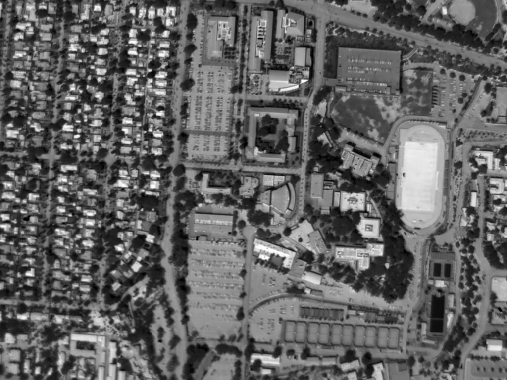 Daytime Aerial Thermogram of a College Campus with Synthetic Turf at an Apparent Temperature Exceeding 170°F. Ground Ambient Temperature Approximated 105°F.