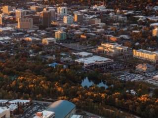 Aerial Photography-Boise State Football with Boise River, Downtown Boise, and Boise Foothills Near Sunset.